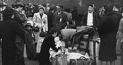 Japanese Americans by the train station