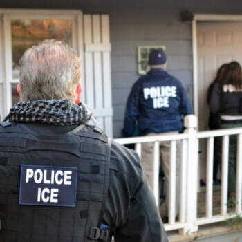 Photo of ICE and Police at the Door