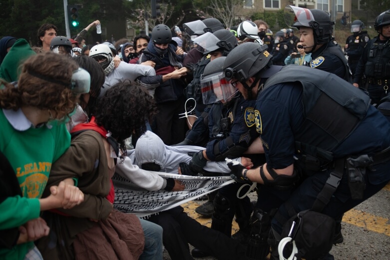 Police rush protesters