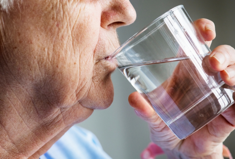 shutterstock image of person drinking water