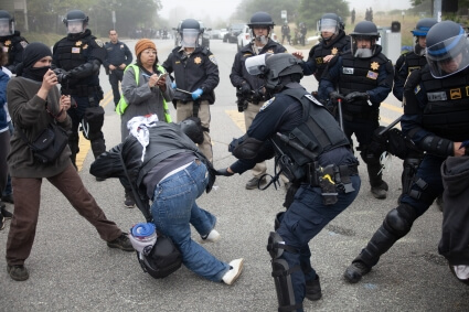 Police attack press photographer