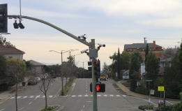 Cameras on a stop signal poll.