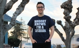 ACLU client Taylor Victor wearing t-shirt that reads "Nobody Knows I'm a Lesbian"